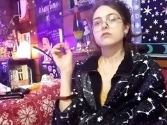 Sexy Hippie Goddess Girl With Dreadlocks Lights and Smokes Cigarette