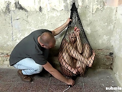 Kidnapped and tied up in a net submissive slave Katy Sky