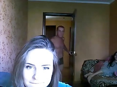 Bottomless girlfriends almost caught during webcam by their neighbor