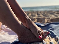 Naked on a nudist beach and paying with her feet - allfootsiefans