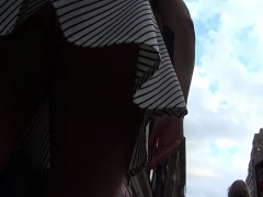 Dazzling amateur babe with a sensational ass upskirt outside